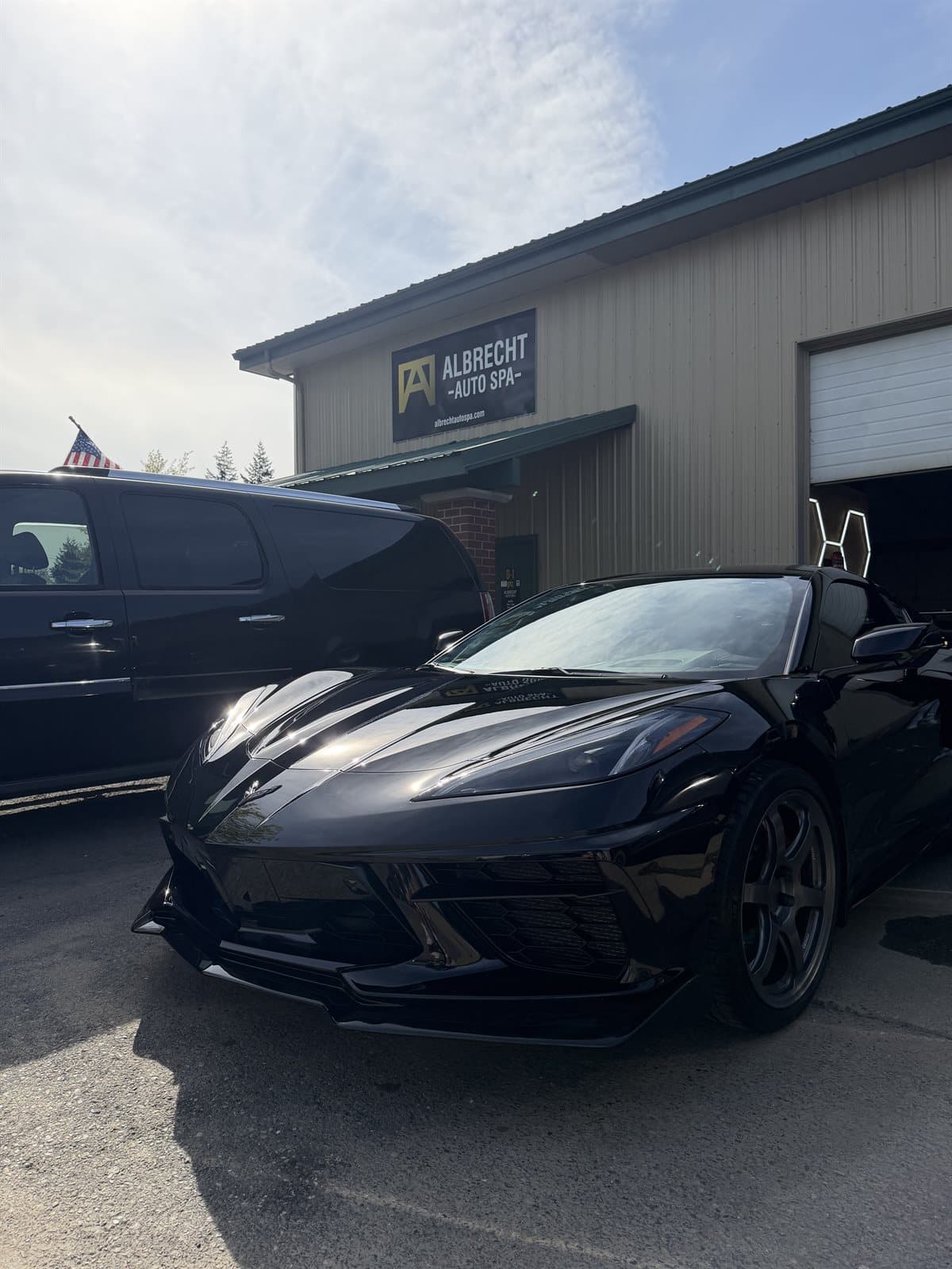 Black Corvette with ceramic coating and paint protection film at Albrecht Auto Spa