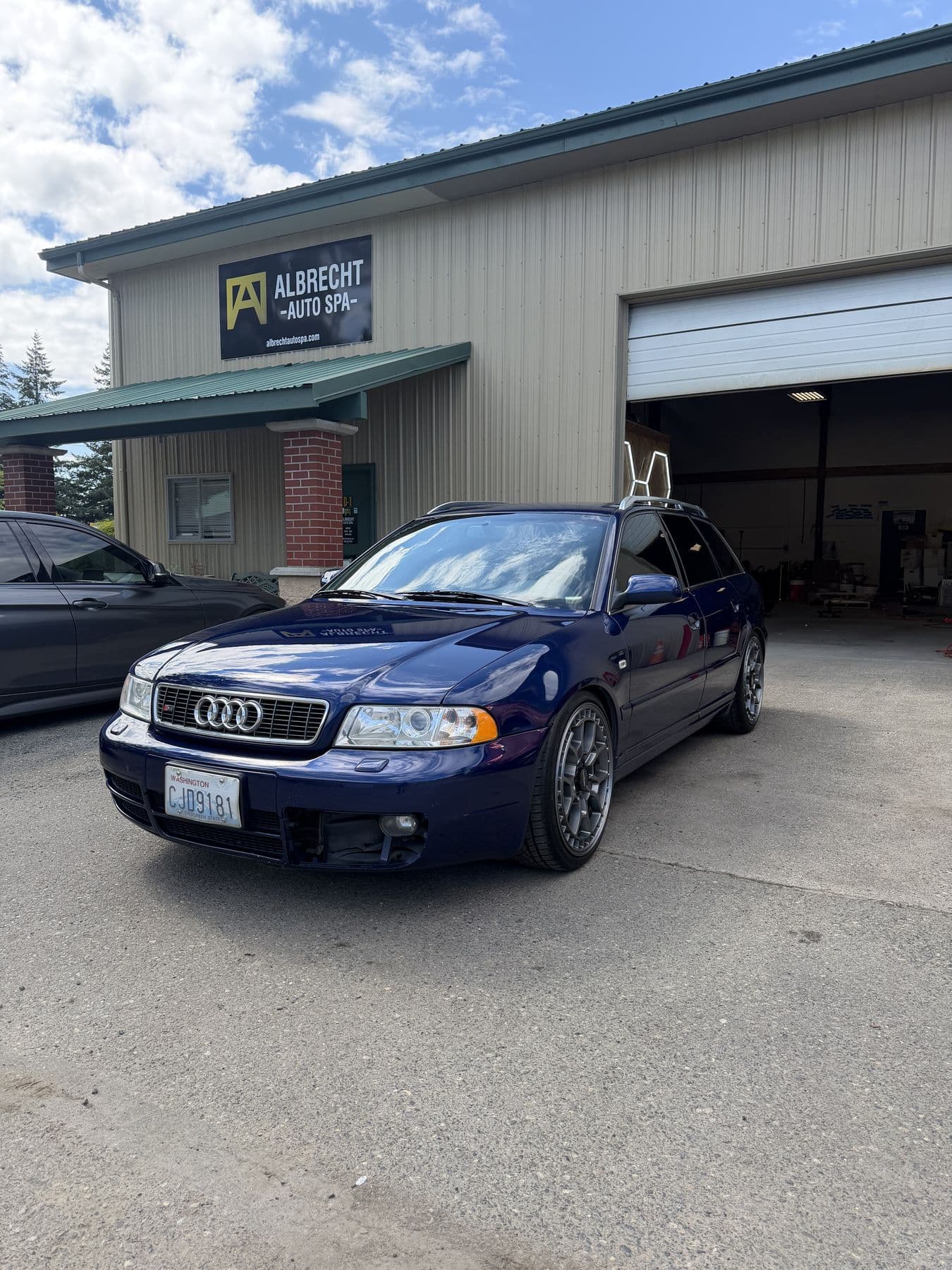 Dark blue Audi S4 after paint correction outside Albrecht Auto Spa in Ferndale, WA