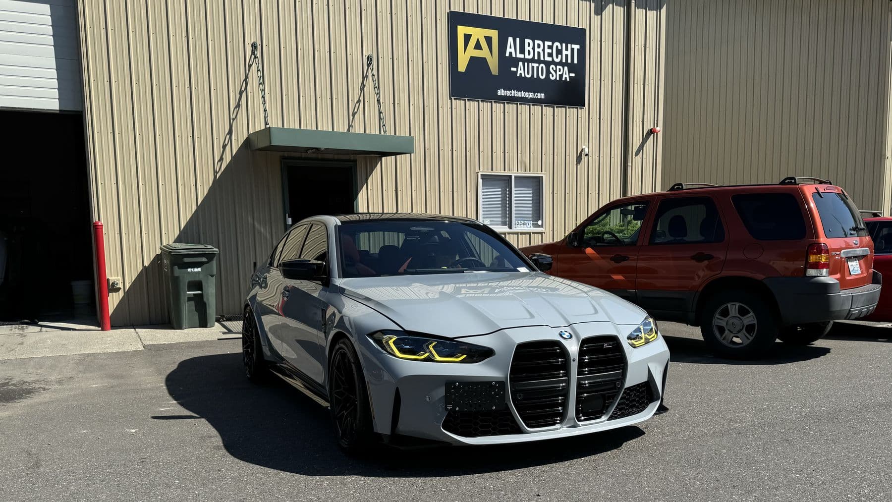 Grey BMW M3 G80 detailed outside Albrecht Auto Spa in Ferndale, WA