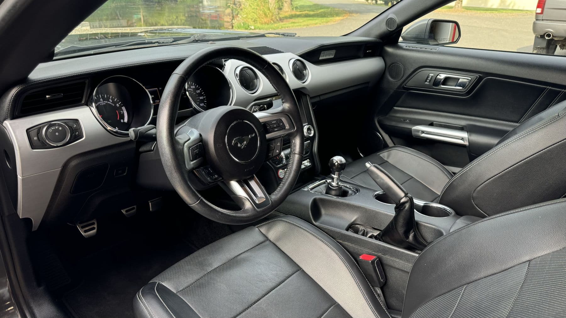 Ford Mustang leather interior after a full cabin detail at Albrecht Auto Spa in Ferndale, WA