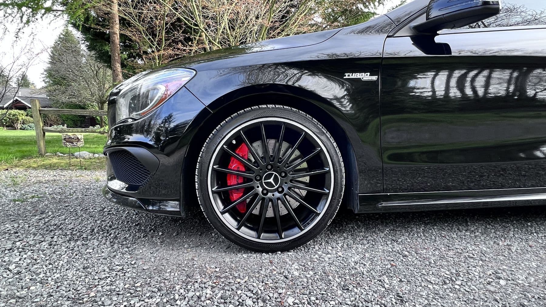 Black Mercedes-Benz CLA with ceramic coated wheels and red brake calipers, Whatcom County WA