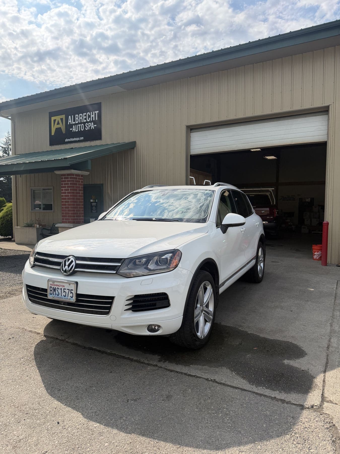 White Volkswagen Touareg after a full detail at Albrecht Auto Spa in Ferndale, WA