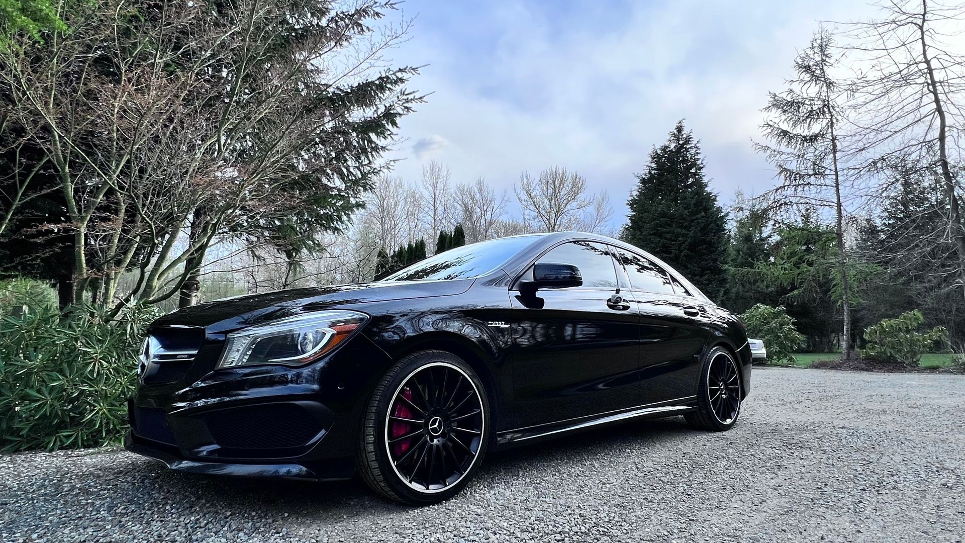 Black Mercedes-Benz CLA with a mirror-flat finish